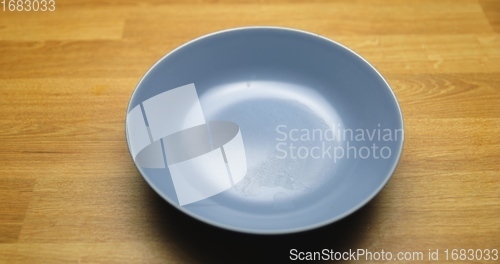 Image of Empty bowl on the table closeup photo