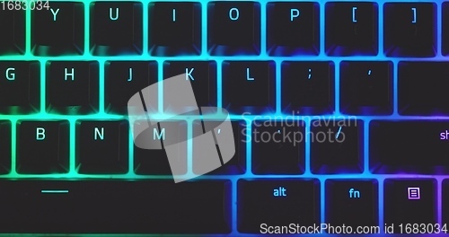 Image of illuminated mechanical keyboard closeup photo