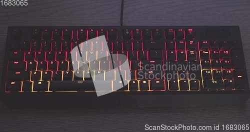 Image of illuminated mechanical keyboard closeup photo