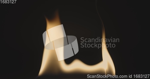 Image of Fire dancing against dark background