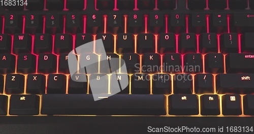 Image of illuminated mechanical keyboard closeup photo