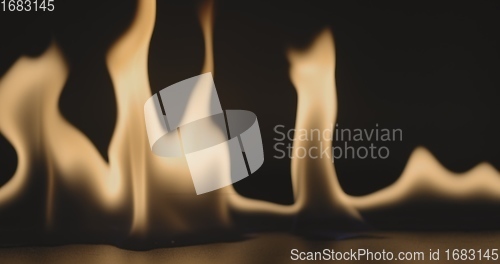 Image of Fire dancing against dark background