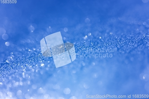 Image of Smooth colorful liquid flowing as background texture