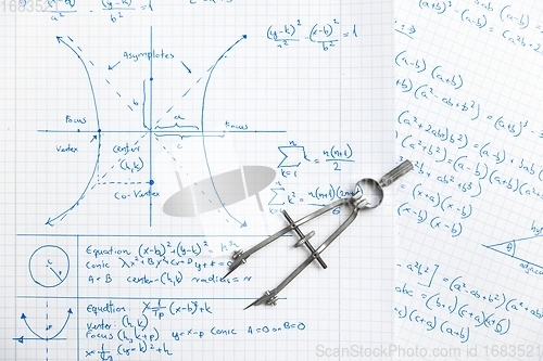 Image of Math exersize in white notebook closeup