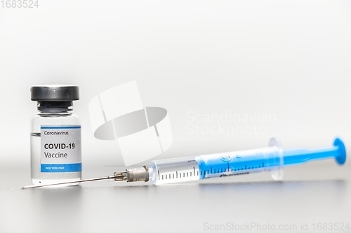 Image of Vaccine for virus in small bottles