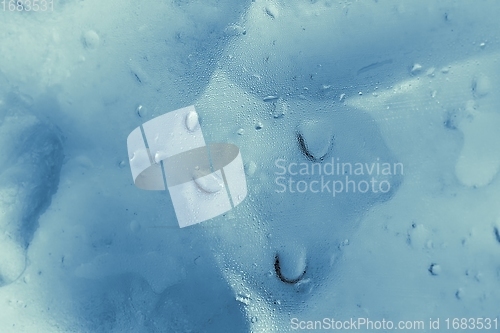 Image of Ice cubes as background texture closeup photo