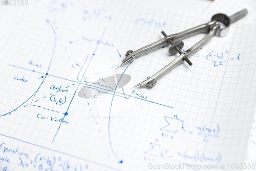 Image of Math exersize in white notebook closeup