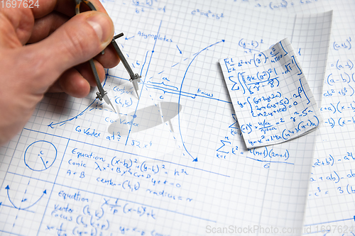 Image of Math handwriting in notebook closeup