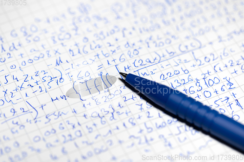 Image of Math handwriting in notebook closeup