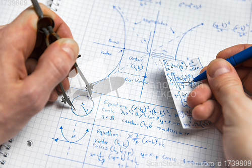 Image of Math handwriting in notebook closeup