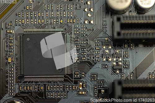 Image of Closeup of computer board with conductors