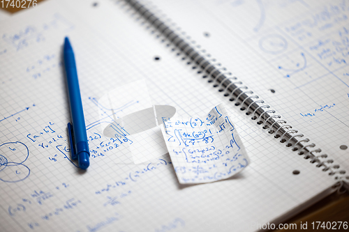 Image of Math handwriting in notebook closeup