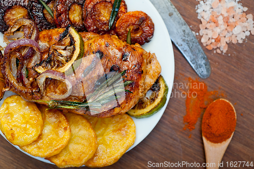 Image of roasted grilled BBQ chicken breast with herbs and spices 