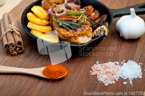 Image of roasted grilled BBQ chicken breast with herbs and spices 