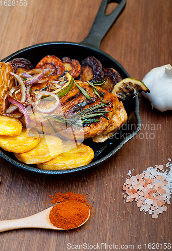 Image of roasted grilled BBQ chicken breast with herbs and spices 