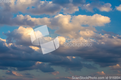 Image of White clouds on evening blue sky