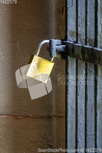 Image of Padlock on iron gate