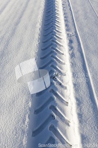 Image of Tire tracks on snow