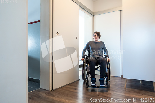 Image of disabled woman in her apartment