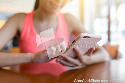 Image of Woman using mobile phone