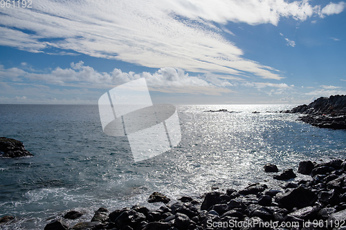 Image of beautiful wild beach with black sand