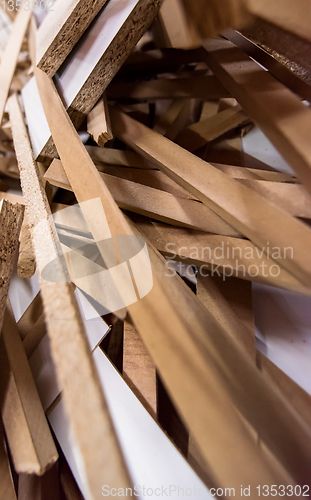 Image of Cut wood pieces remaining from carpenter handcraft
