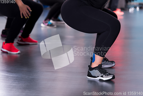 Image of sporty women doing aerobics exercises