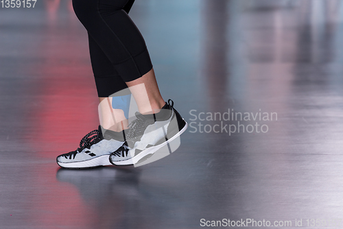 Image of sporty woman doing aerobics exercises