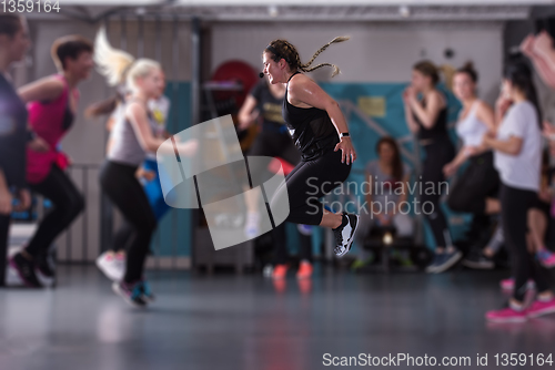 Image of sporty women doing aerobics exercises