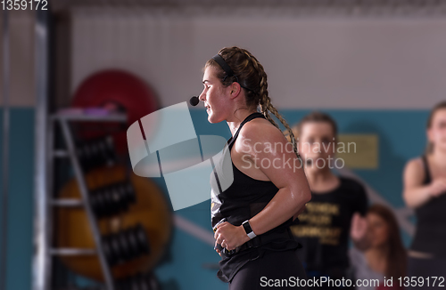 Image of sporty women doing aerobics exercises