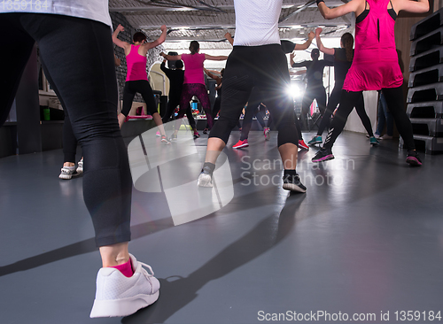 Image of sporty women doing aerobics exercises