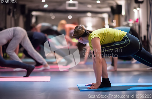 Image of sporty women doing aerobics exercises