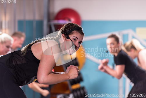 Image of sporty women doing aerobics exercises