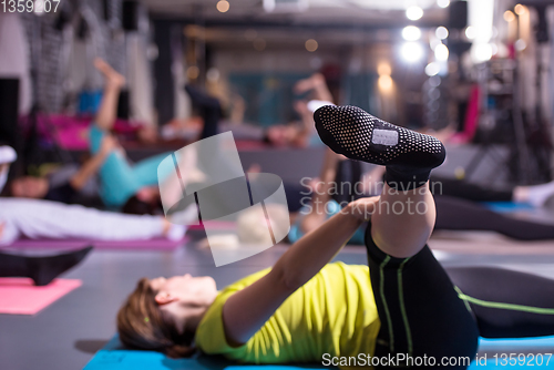 Image of sporty women doing aerobics exercises