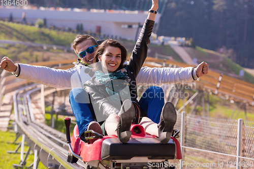 Image of couple driving on alpine coaster