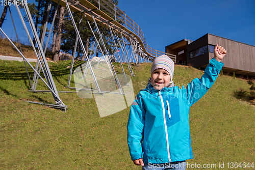 Image of portrait of a boy under alpine coaster