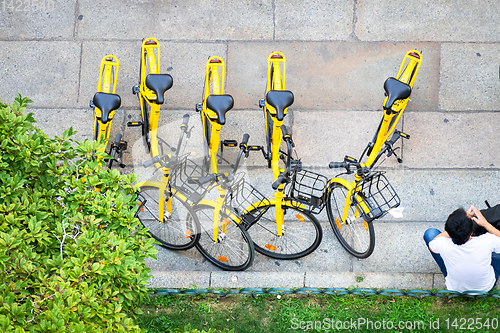 Image of yellow bicycles from above