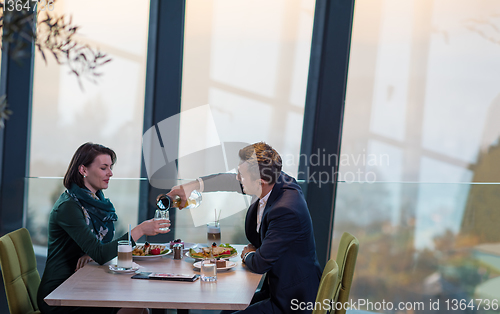 Image of loving couple enjoying romantic dinner