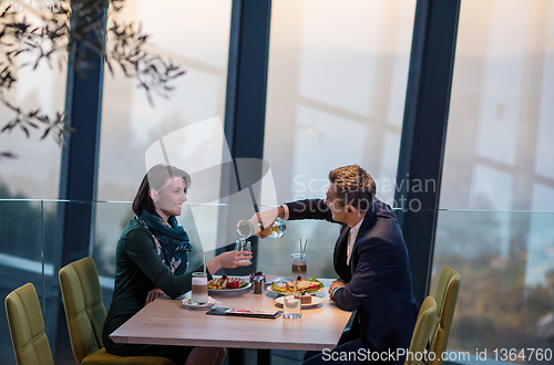 Image of loving couple enjoying romantic dinner