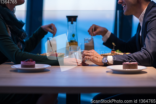 Image of loving couple enjoying romantic dinner