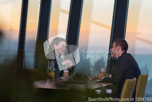 Image of loving couple enjoying romantic dinner