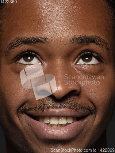 Image of Close up portrait of young african-american man
