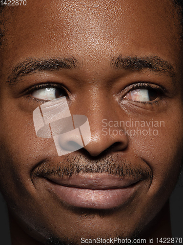 Image of Close up portrait of young african-american man