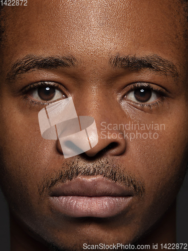 Image of Close up portrait of young african-american man