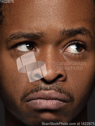 Image of Close up portrait of young african-american man