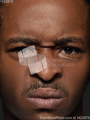 Image of Close up portrait of young african-american man