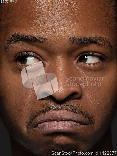 Image of Close up portrait of young african-american man