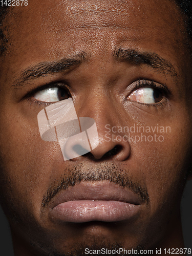 Image of Close up portrait of young african-american man