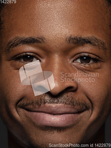 Image of Close up portrait of young african-american man