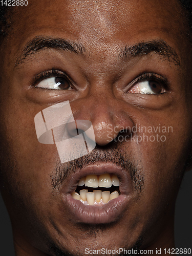 Image of Close up portrait of young african-american man